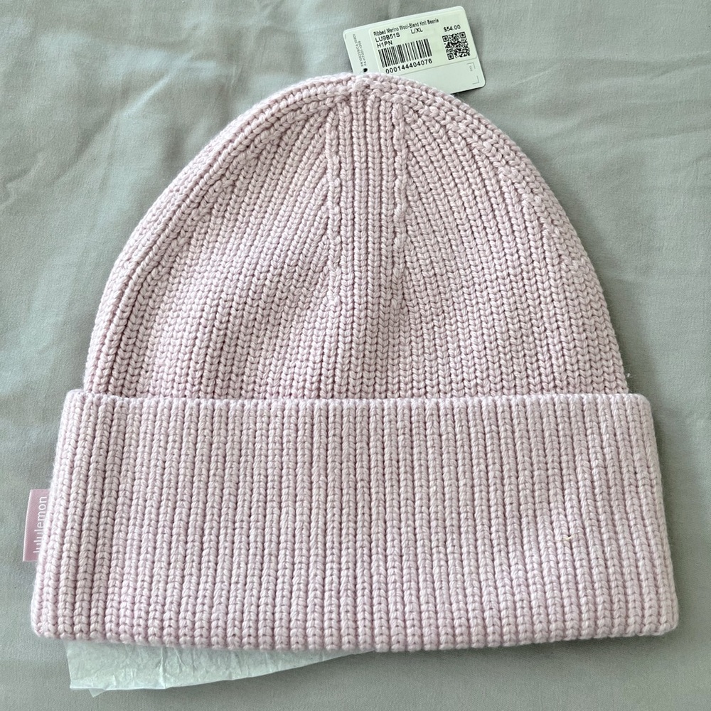 NWT Lululemon women’s pink beanie (size L/XL)